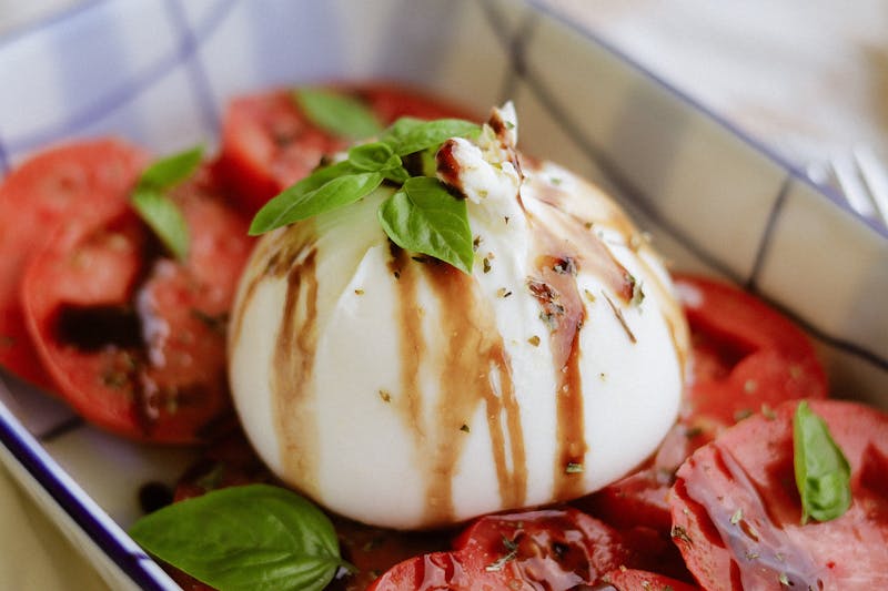 Burrata and heirloom tomato starter from pizzaluce