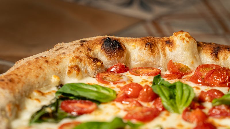 pizza luce Margherita pizza with fresh tomato and basil