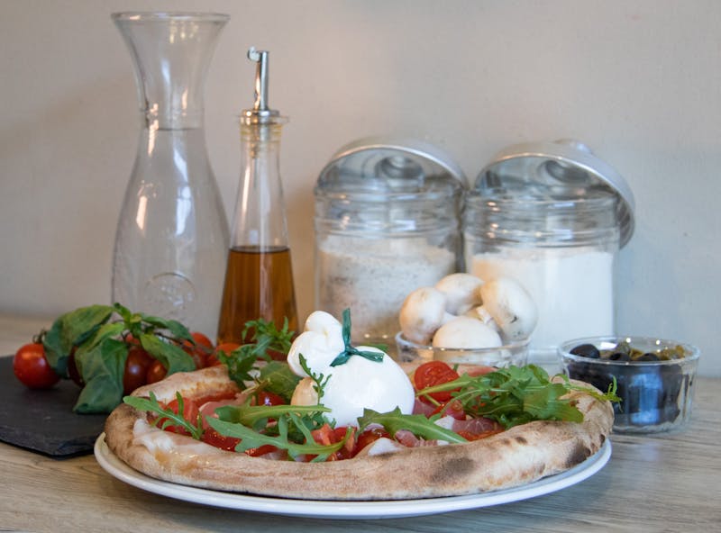Arugula pear and gorgonzola salad from Pizza luce menu